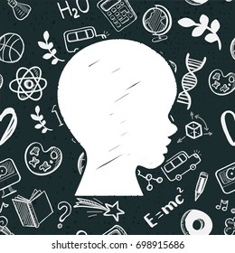 School education concept. Hand drawn. Vector illustration. Chalkboard background. Kids face profile contour with many doodle icons.