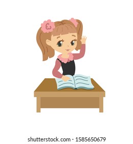 School. First call. First grade. The student raised his hand. Schoolgirl at her desk
