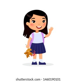 School girl, happy pupil flat vector illustration. Asian girl holding autumn leaves and berries isolated cartoon character. Elementary school student with backpack. Cheerful young lady. Back to school