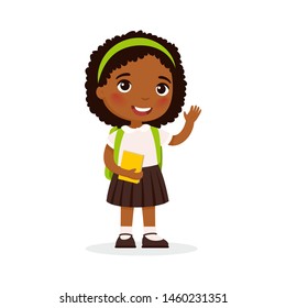 School girl, happy student flat vector illustration. Waving girl with book and backpack isolated cartoon character. Elementary school pupil. Cheerful african american young lady. Back to school