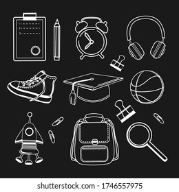 School icons, backpack, alarm clock, notebooks, ball, gym shoes, rocket on a black background