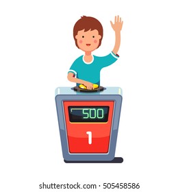 School kid playing quiz game answering question standing at the stand with button. Boy pressed the buzzer first and raised hand up. Colorful flat style cartoon vector illustration.