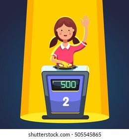 School kid playing quiz game answering question standing at the stand with button. Girl pressed the buzzer first and raised hand up in the light of spotlight. Colorful flat cartoon vector illustration