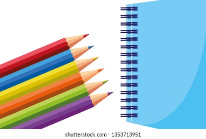 school notebook with colors pencils