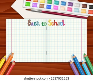 School notebook for learning writing on background with colored pencils and drawing sheet, watercolor paints with art brush on wooden surface. Used as Back to school promotion banner for web design.