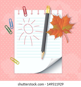 School notepad with pencil and autumn leaf on polka dot background