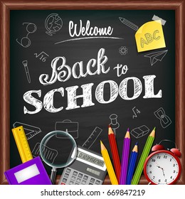 School and office supplies on blackboard background