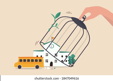 School reopen and keep social distancing after COVID-19 lockdown to prevent Coronavirus spreading in children concept, hand open bird cage over school to let school bus to go to pick up students.