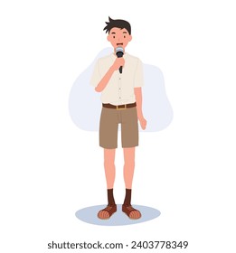 School Speech and Presentation concept. Confident Thai student in School Uniform Speaking with Microphone.