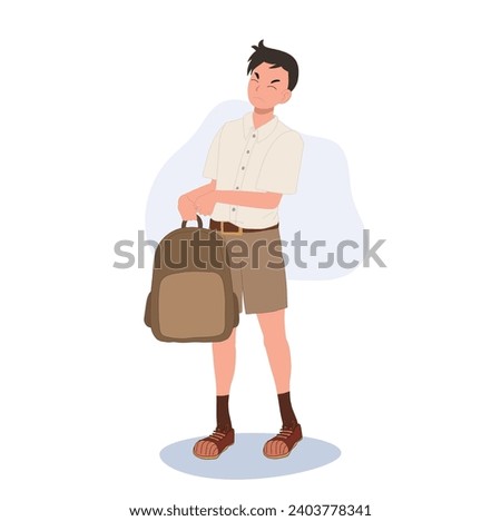 School Stress Concept.  Thai Student in Uniform with  a Heavy Bag.  Overloaded