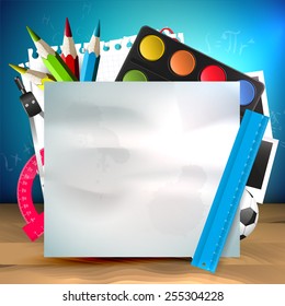 School supplies and empty paper with place for your text