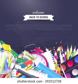 School supplies in front of blackboard - school background with place for your text

