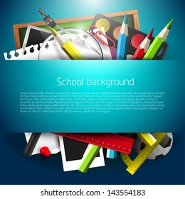 School supplies on blue background with place for text