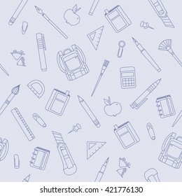 School supplies seamless pattern on blue background