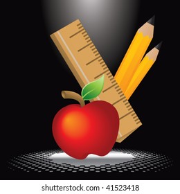 school supplies under spotlight