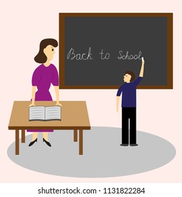 A school teacher and student at the blackboard write the text