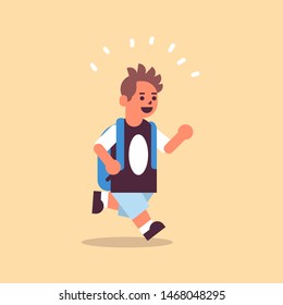 schoolboy with backpack running back to school education concept male pupil having fun flat full length