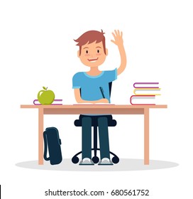 Schoolboy in classroom sitting at his desk and learning. Elementary school pupil raising hand. Vector illustration.