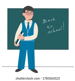 Schoolboy in glasses with books in his hands stands in front of blackboard. Vector illustration in the flat design style. 
