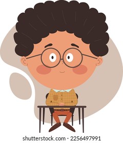 escolar sentado en un escritorio con las manos dobladas