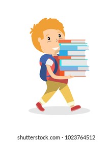 Schoolboy walking and carrying a tall stack of school books