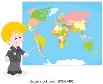 Schoolboy at a World map