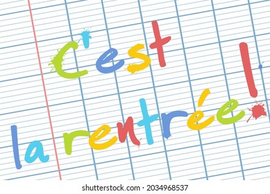 Schoolboy's writing page with the words "C'est la rentrée!!" (back to school in french) written in several colors