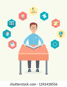 Schoolchild learns lessons at the desk