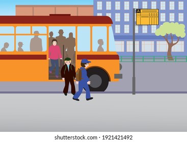 Schoolchildren get off the bus through the front door at the bus stop in the city. 