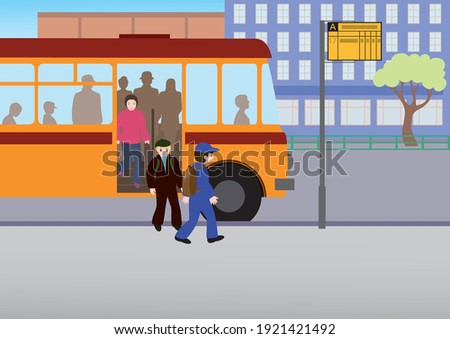 Schoolchildren get off the bus through the front door at the bus stop in the city. 