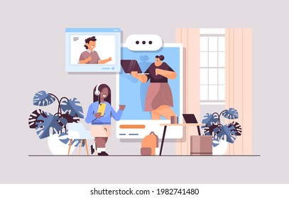 schoolchildren in web browser windows discussing with teacher during video call self isolation online communication