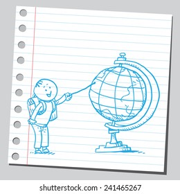 Escolar apuntando al escritorio del mundo