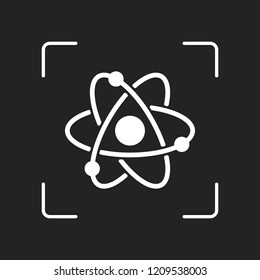 scientific atom symbol, simple icon. White object in camera autofocus on dark background