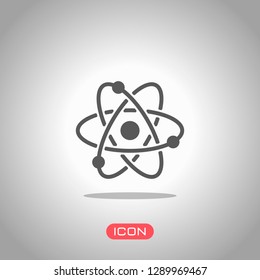 scientific atom symbol, simple icon. Icon under spotlight. Gray background