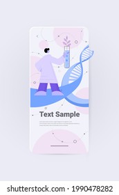 scientist analyzing DNA of plants in test tube researcher making experiment in lab genetically modified plants