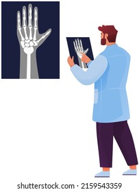 Scientist looking at x-ray of human hand. Treatment, health care, diagnosis. Specialist diagnoses patient by roentgen. Doctor analyzes results of medical checkup. Orthopedist examining injury