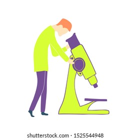 A scientist looks through a microscope. Medical or chemical laboratory.