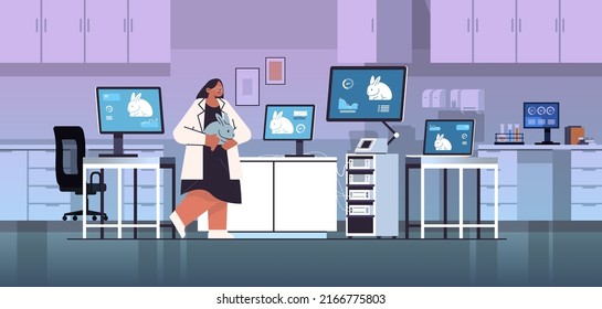 scientist work on desktop with rabbits on screens veterinary worker doing experiments in lab biological genetic engineering research