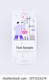 scientist working with test tubes in medical laboratory researcher doing scientific experiments in lab