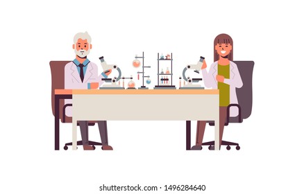 scientists couple using microscope man woman in uniform sitting at table making scientific experiments in chemistry laboratory with test tubes research science concept full length