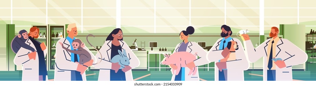 scientists or veterinary workers doing experiments in lab with experimental animals biological genetic engineering research