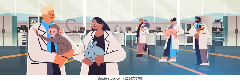 scientists or veterinary workers doing experiments in lab with experimental animals biological genetic engineering research