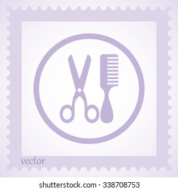 Scissors and comb icon