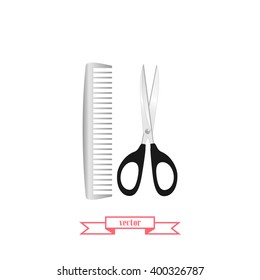 Scissors and comb icon
