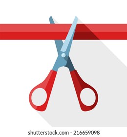 Scissors cut red ribbon on white background