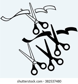 Scissors cut the ribbon. Isolated on blue background. Vector silhouettes