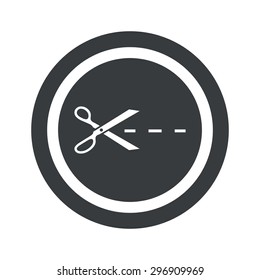 Scissors cutting along the line in circle, on black circle, isolated on white