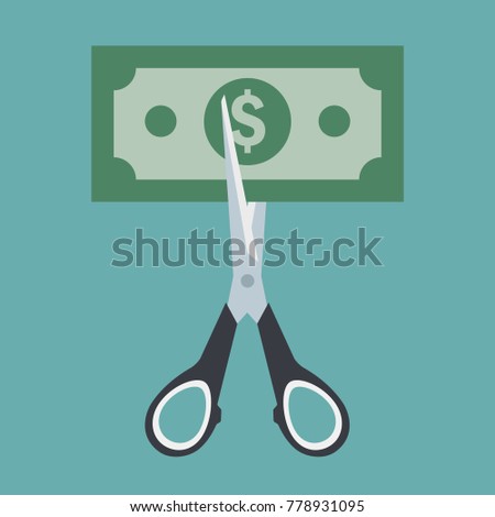 Scissors cutting banknote