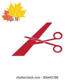 Scissors cutting ribbon