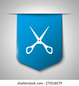 Scissors are cutting a strand of flowing hair and the background is blue.